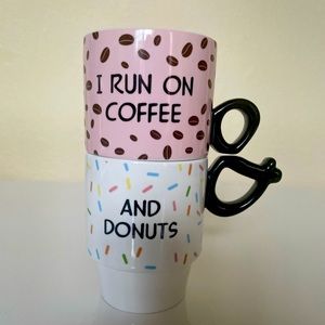 Set of 2 Coco + Lola premium collection mugs.